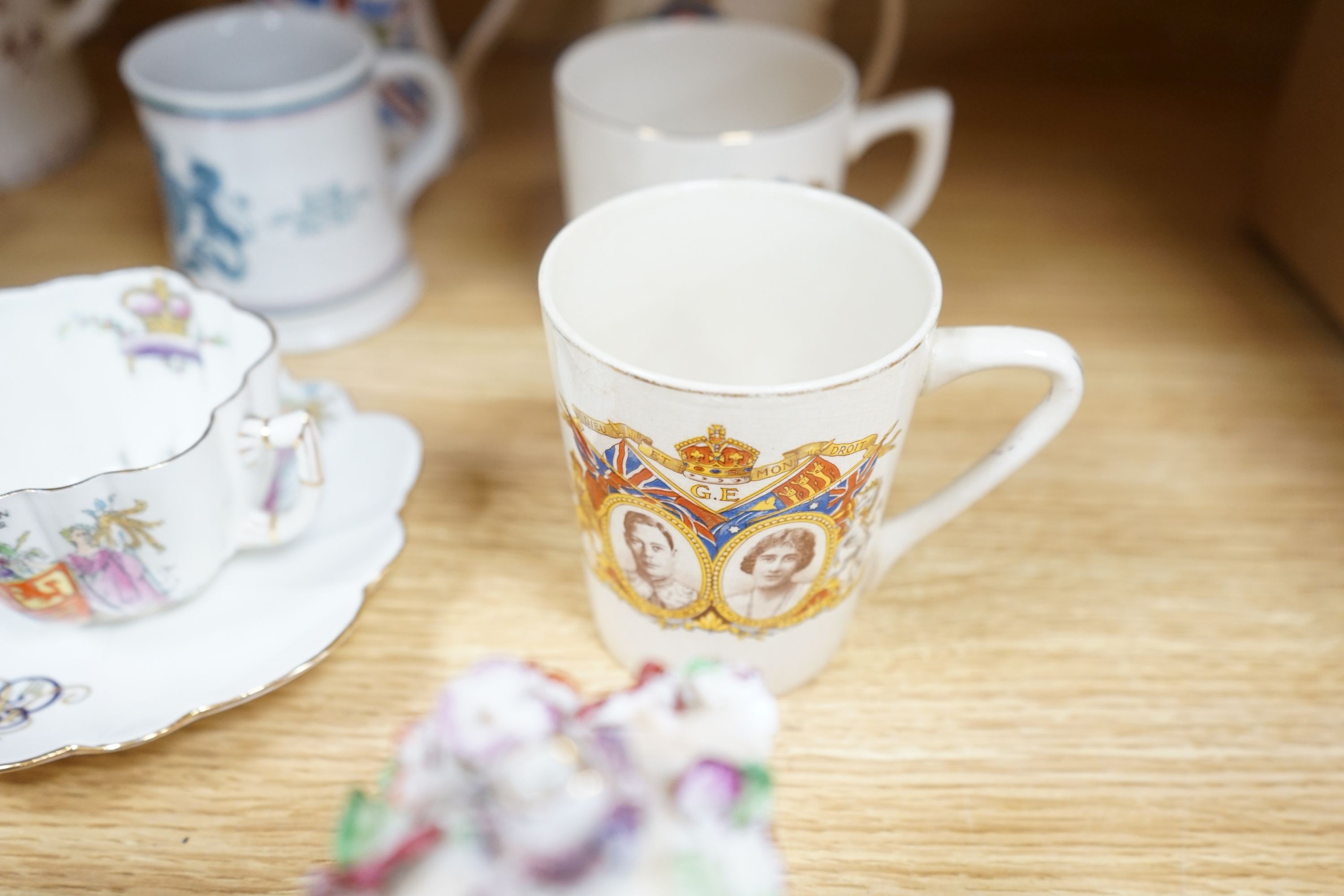 Royal commemorative ceramics and five mid 19th century Staffordshire porcelain models of cottages, etc.